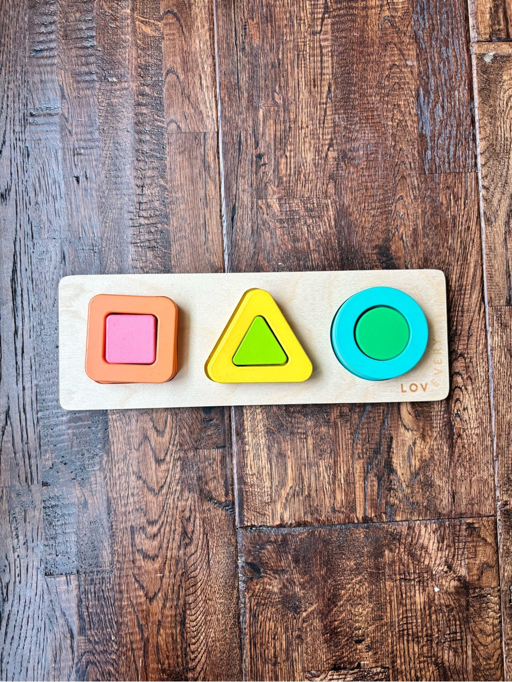 Lovevery geo shapes puzzle from the realist play kit